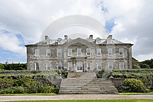 English Country House and Flowerbeds