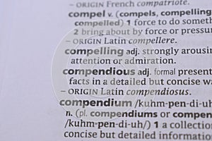 English Dictionary Book Page Close Up With The Word Transcription Of -compendious