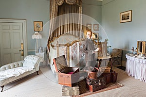 English gentleman with suitcases