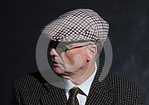 English gentleman in sunglasses and tweeds