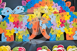 English and hebrew wooden alphabet puzzle looks like elephant