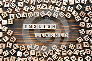 English learner - phrase from wooden blocks with letters