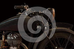 English motorcycle in front of a black background