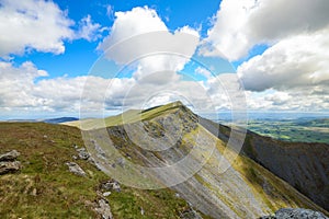 English mountain top with blue skies and clouds