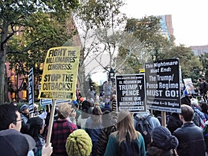 English and Spanish Language Signs, Anti-Trump Protest, Washington Square Park, NYC, NY, USA