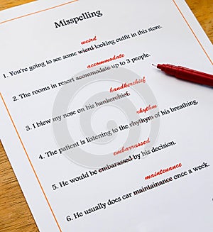 English spelling correction sheet on table