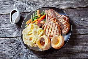 English Sunday roast on a black plate
