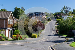 English village street view with houses and road