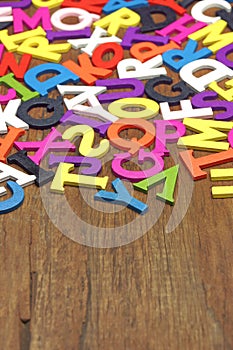 English Wooden Colorful Letters On The Vertical Wood Background