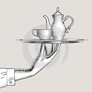 Engraved vintage drawing of a Female hand holding a round tray with coffee or tea pot and cup