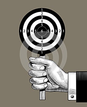 Engraved vintage drawing of a Hand holding a round target with numbers