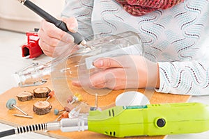 Engraving the bottle with rotary multi tool