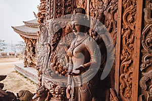 Engraving Wooden Angel Sculptures in Sanctuary of The Truth at Pattaya. Chonburi Province, Thailand