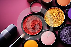 Enhance your eye makeup game with this set of diverse colored eyeshades and a brush, Top view of a makeup cosmetics set, AI