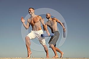 Enhancing the benefit of health activities. Muscular men do sport. Men with muscular bodies enjoy good health. Success