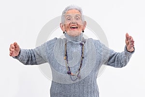 Enior woman hugging on white background