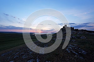 Enisala fortress in Romania with a beautiful summer sunset