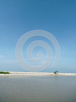 enjoy the beach on a sunny day and warm sunshine and blue sky and sea water that brings a gentle sea breeze