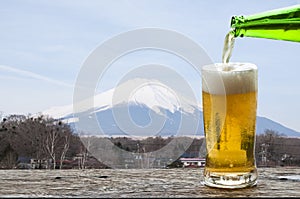 Enjoy beer with landscape of Mt.Fuji, Japan.