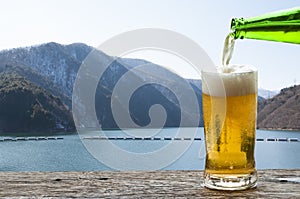 Enjoy beer with mountain landscape in Japan.
