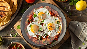 Enjoy a classic Mexican breakfast of huevos rancheros , Ai Generated photo