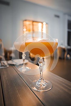Enjoy Elegant Cocktails on a Wooden Table, Modern Spa Resort Lounge.