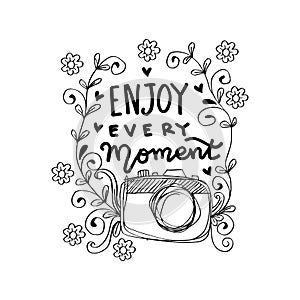 Enjoy every moment in your life hand lettering with camera.