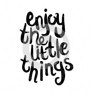 Enjoy the little things. Black and white lettering.Letter. Quote. Vector hand-painted illustration. Decorative inscription. Font.