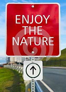 Enjoy the nature red sign board