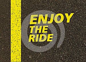 Enjoy the ride written on the road.