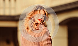 Enjoy softness. Blonde girl make up face in fall outfit. Knitwear concept. Vogue model. Cashmere woolen sweater. Warm