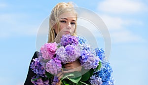 Enjoy spring without allergy. Girl tender blonde hold hydrangea bouquet. Allergy free life. Stop allergy blooming season