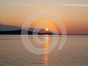 Enjoy the sunset on Bungin Island, Indonesia photo