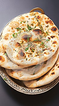 Enjoy Tandoori naan, a classic accompaniment to Indian dishes.