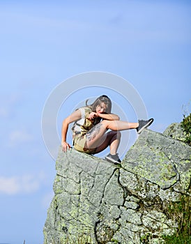 Enjoy the view. Tourist hiker girl relaxing edge cliff. Dangerous relax. Extreme concept. On edge of world. Woman sit on