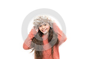 Enjoy the weather. cheerful little kid isolated on white. ready for winter cold. small girl earflap hat. her favorite
