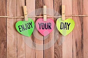 Enjoy your day heart shaped note