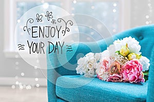 Enjoy Your Day message with flower bouquets with chair