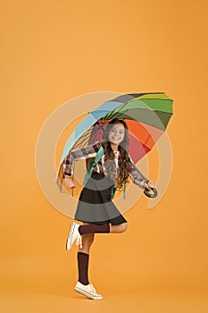 Enjoying autumn day. color up life. go to school. good weather forecast. under my umbrella. small girl bright parasol