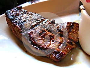 Enjoying a beef steak for dinner