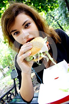 Enjoying eating Fast food