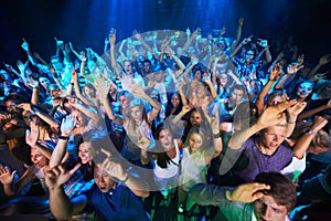 Enjoying every song the band plays. Shot of a large crowd at a music concert.