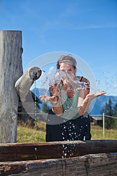 Enjoying fresh mountain water