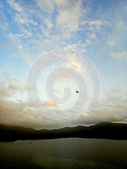 Enjoying nature in rainy season with nice sunset mountain cloud water landscape and sky