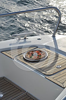 Enjoying pizza on a yacht is even more beautiful.  Included in 100 things to do.