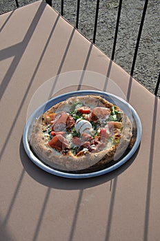 Enjoying pizza on a yacht is even more beautiful.  Included in 100 things to do.  Our fried mozzarella is great.