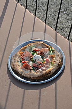 Enjoying pizza on a yacht is even more beautiful.  Included in 100 things to do.  Our fried mozzarella is great.