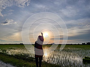 Enjoying sunset moment in Sekinchan, Selangor.