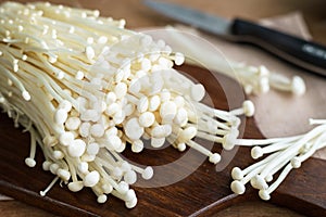 Enoki mushroom on old wooden table