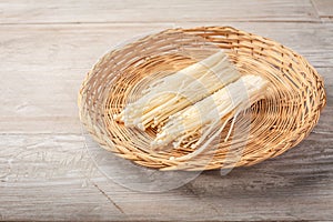 Enoki mushrooms - popular ingredient in asian cuisine. Edible needle mushroom or Enokitake